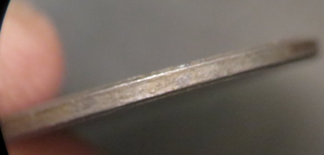 2001-LMC-Unplated-Planchet-Or-Coated?