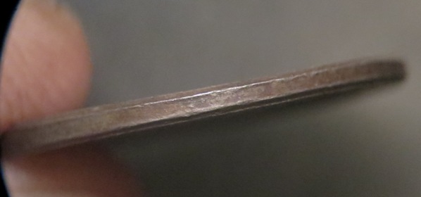 2001-LMC-Unplated-Planchet-Or-Coated?