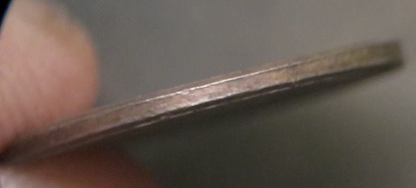 2001-LMC-Unplated-Planchet-Or-Coated?