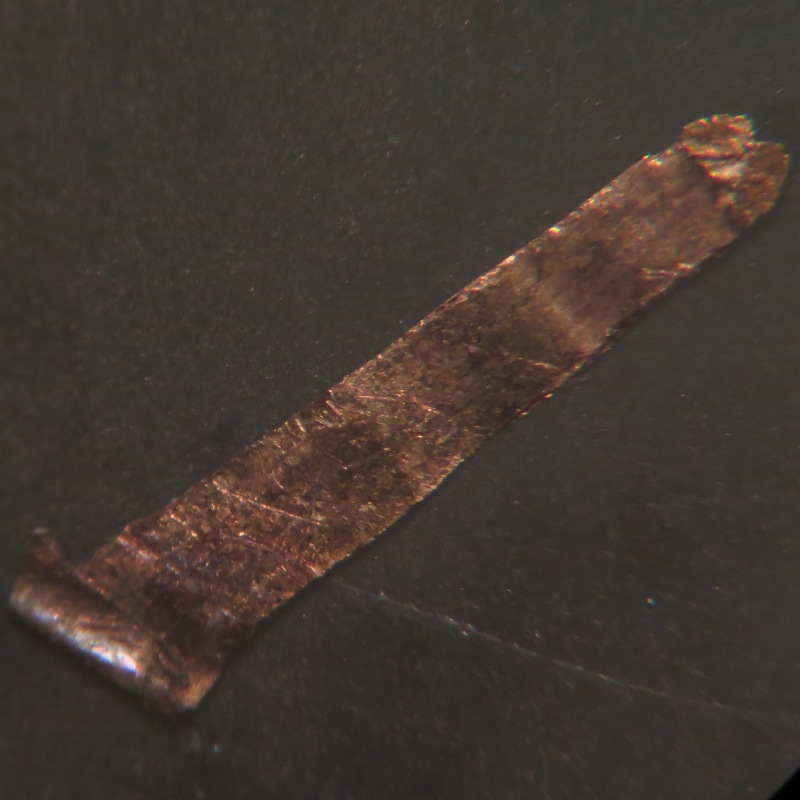 1963-D-LMC-Struck-Through-Debris-Or-Lamination