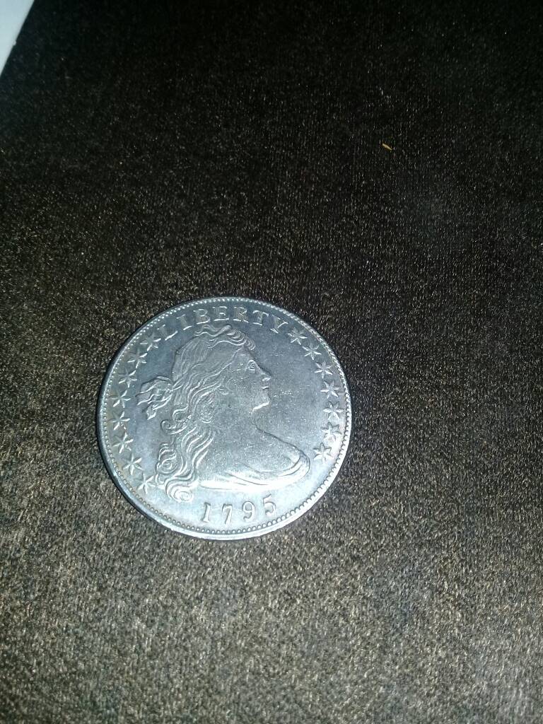 Checking-The-Value-Of-A-Flowing-Hair-1795-Coin