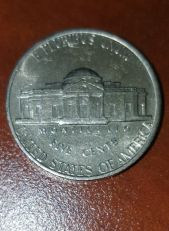 1977-Nickel,-Off-Center-Strike?