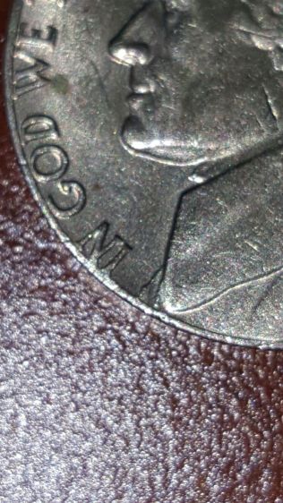 1977-Nickel,-Off-Center-Strike?