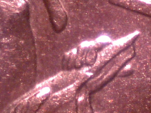 1909-Lincoln-Log-Extra-Fingers?
