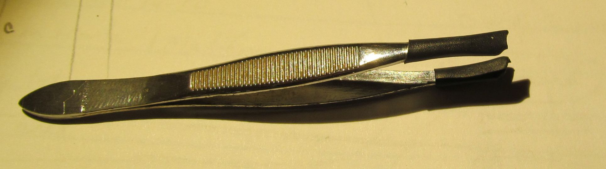 Poor-Man's-Coin-Tweezers-Used-In-A-Pinch