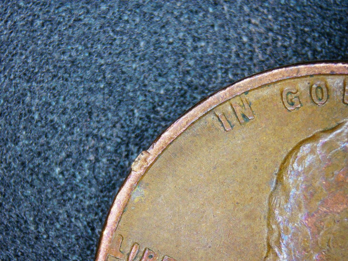 1949-Wheat-Penny.-Is-That-An-E-Stamped-On-The-Rim?