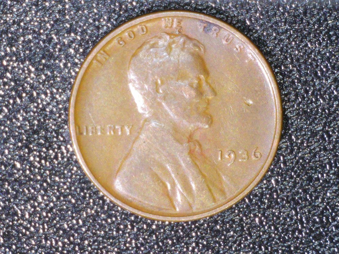 1936-Wheat-Penny.-Could-Someone-Tell-Me-What-That-Is-Above-Lincoln's-Head.