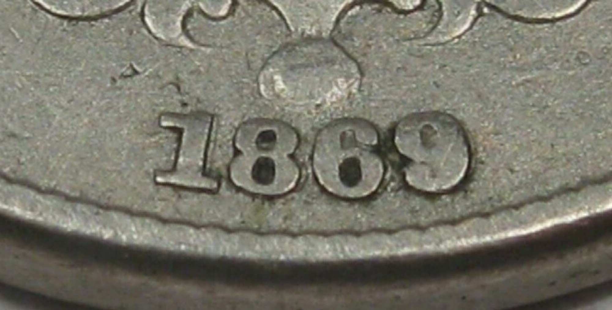 1869-Shield-Nickel-Repunched-Date-Variety?