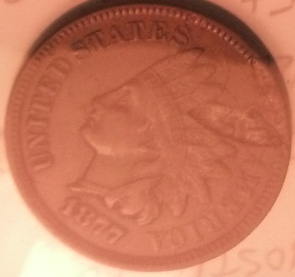1877-IHC-Error-Coin?-Lamination?pre-Strike?