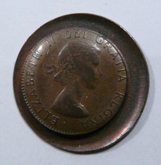 What-Do-You-Think-About-This-Really-Odd-Canada-Error-1964-Penny?