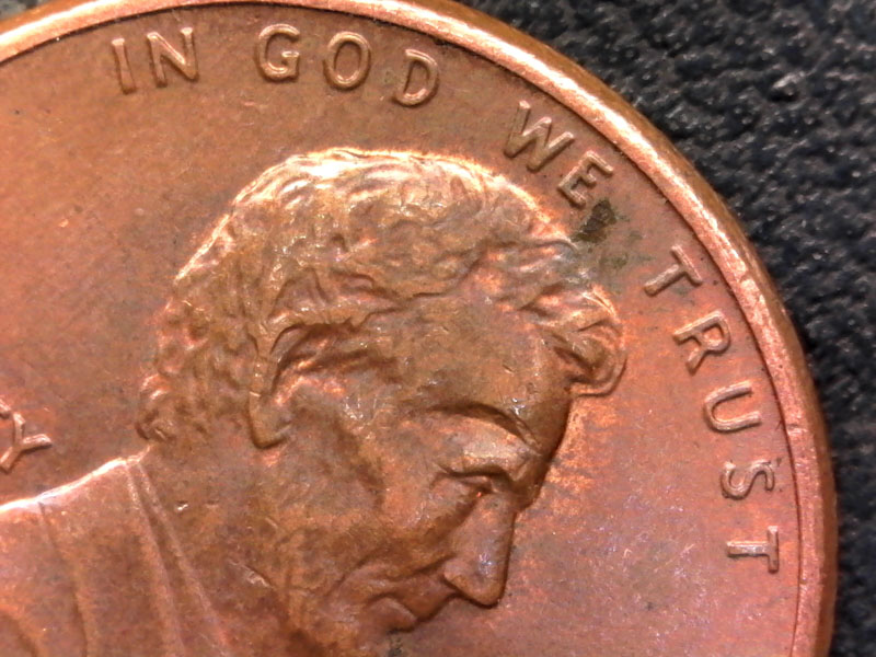 1988-Lincoln-Memorial-Cent-Is-Lamination-Error-Over-The-Eye?-Or-Is-Damage?