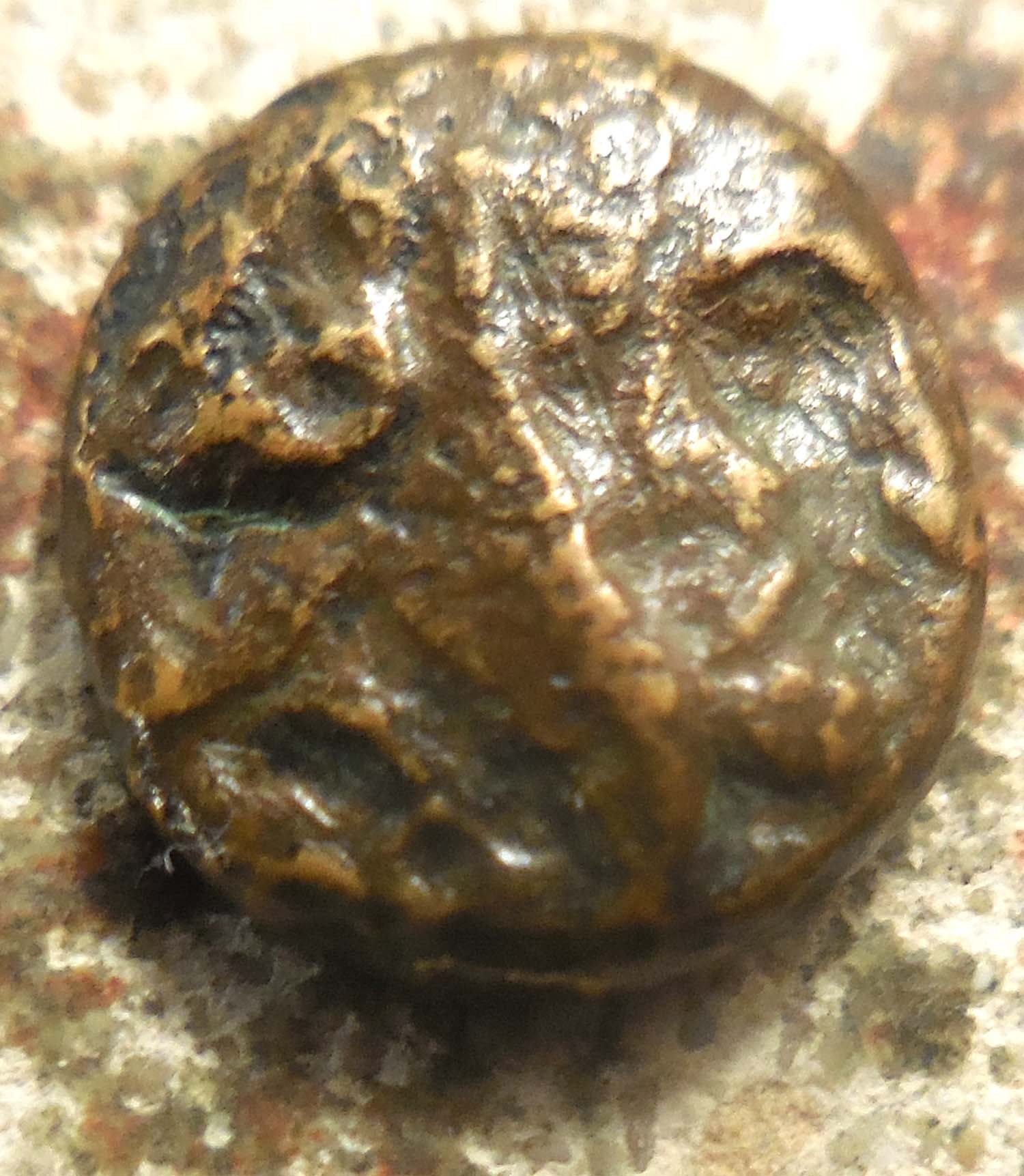 1.15-Grams,-10-MM-Bronze.--VF-Male-Image.