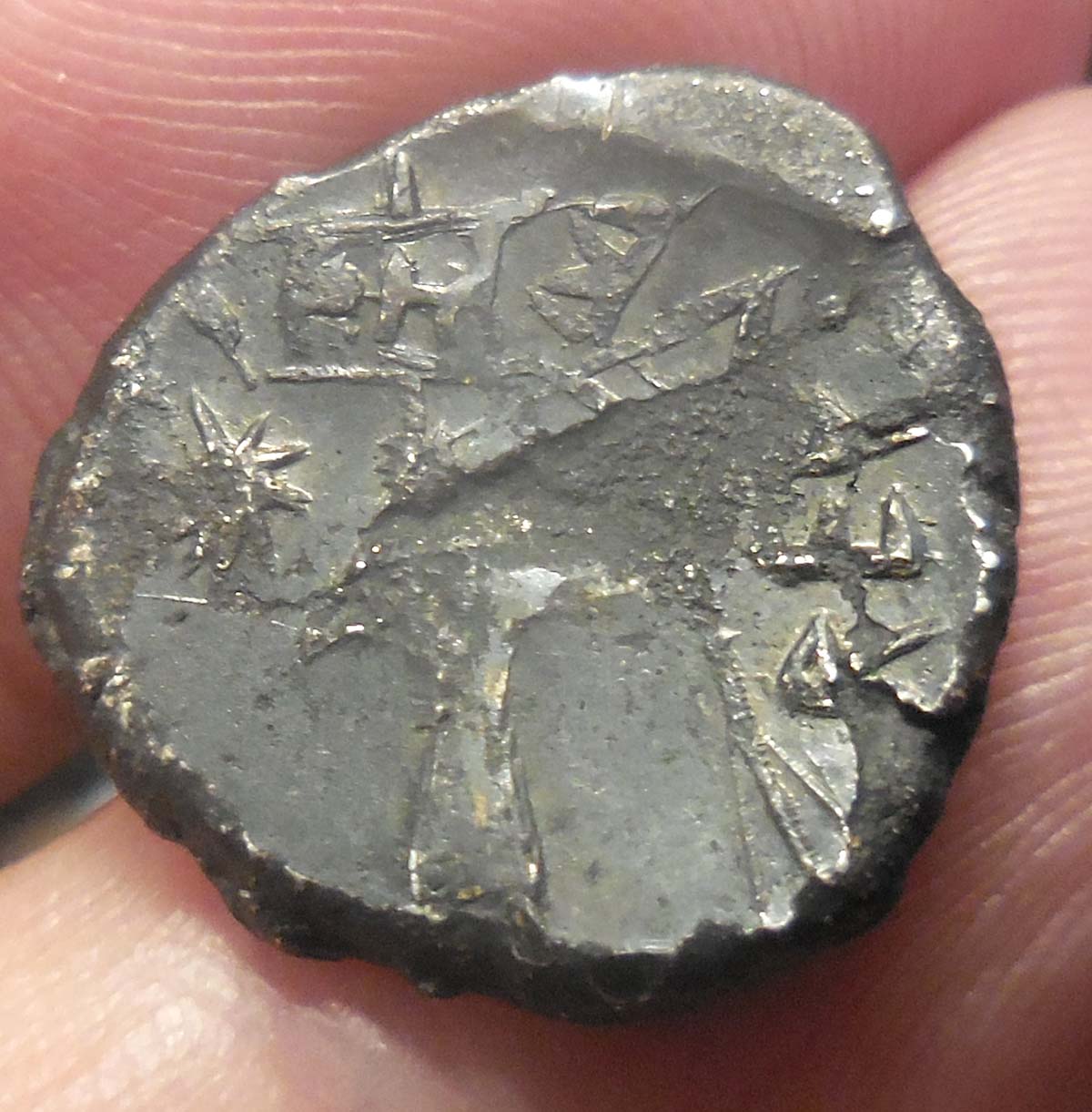 Odd-Surface-Coin-For-Someone-To-Id: