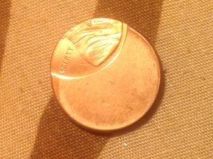 Off-Center-Strike-Penny?