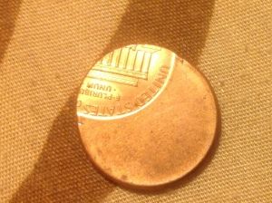 Off-Center-Strike-Penny?