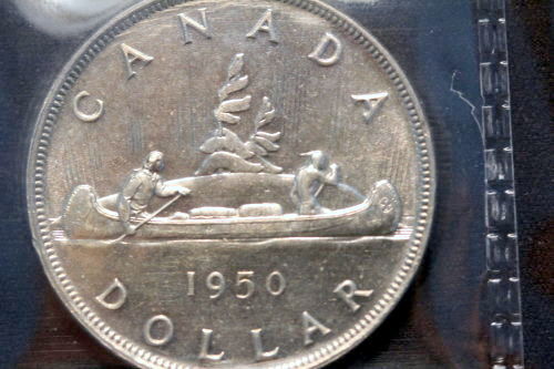 Island-Logs-On-1950-Silver-Cnd-Dollar-?