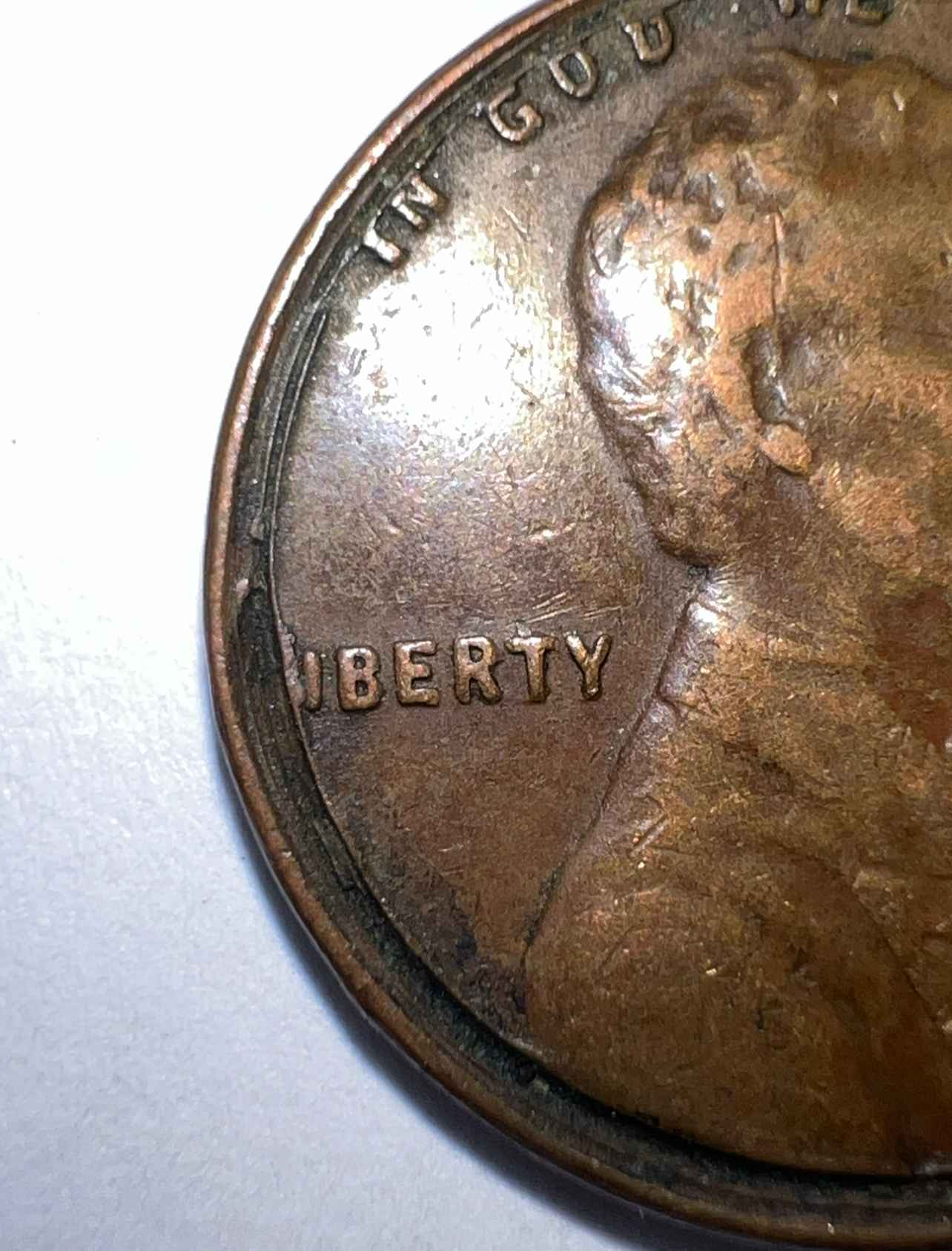 1955-D-Wheat-Penny-With-Deep-Crack-Near-Rim