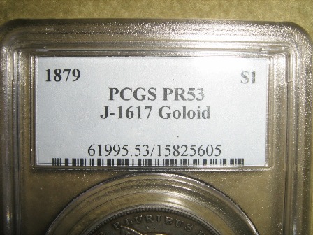 1879-Morgan-Silver-Dollar-With-Metals-Breakdown-On-Reverse.