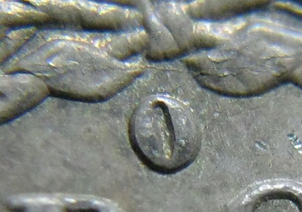 1884-O-Morgan-With-Strike-Through,-Die-Break-&-Clash?