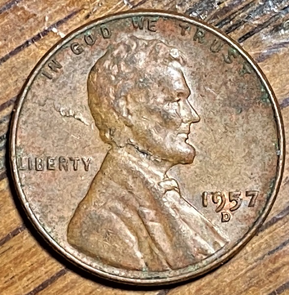 1957-D-Lincoln-Penny-With-Lamination-Through-His-Neck