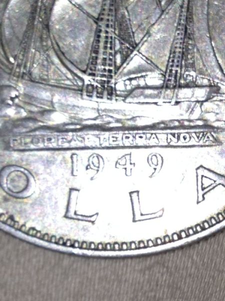 1949-Silver-Dollar-With-Extra-Tag-On-9-In-Date