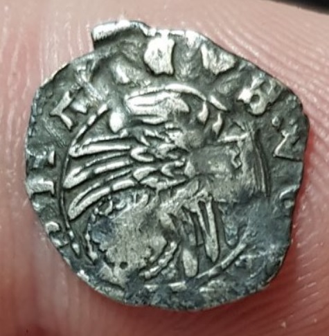 ID-Help-On-Small-Silver-Coin.