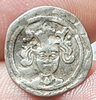 ID-Help-On-A-Silver-Hammered-Coin.