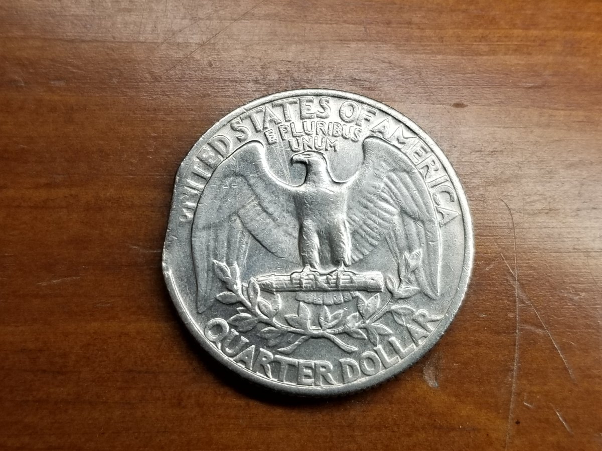 1965-Clipped-Planchet-Quarter