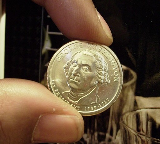 Presidential-Dollar-Coins-In-Hand