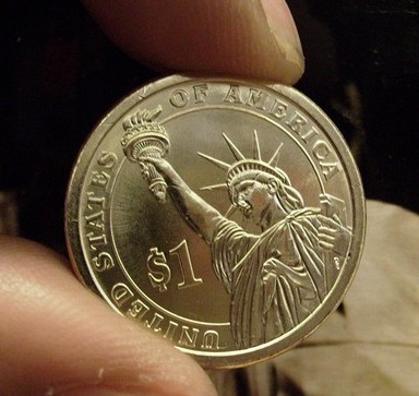 Presidential-Dollar-Coins-In-Hand