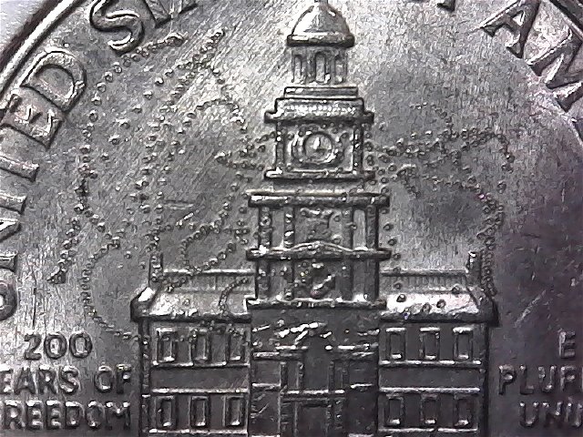 Bicentennial-D--Half-Dollar-With-A-Lot-Of-Little-Marks-PMD?