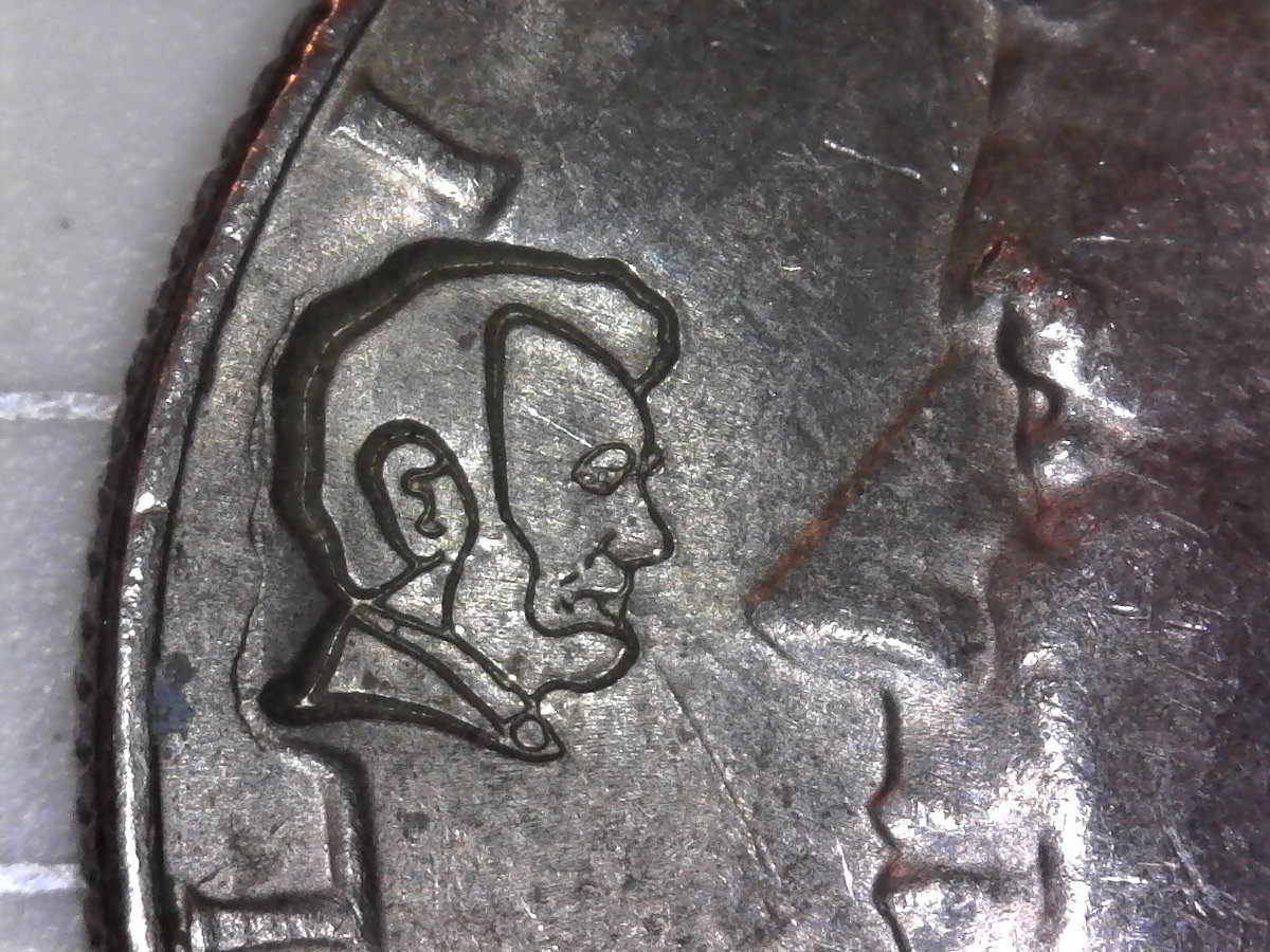 1980-P-Kennedy-Half-Dollar-With-A-Counter-Stamp-Of-Lincoln