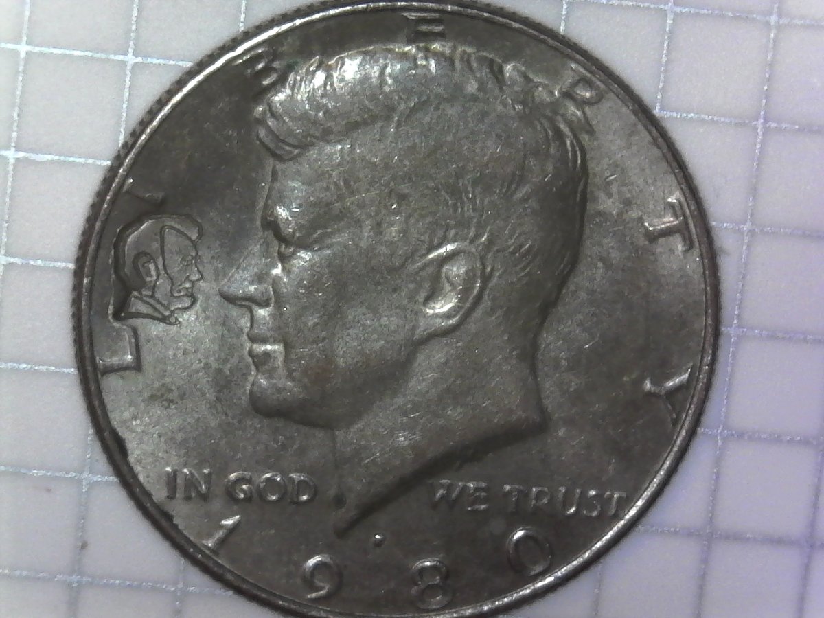 1980-P-Kennedy-Half-Dollar-With-A-Counter-Stamp-Of-Lincoln