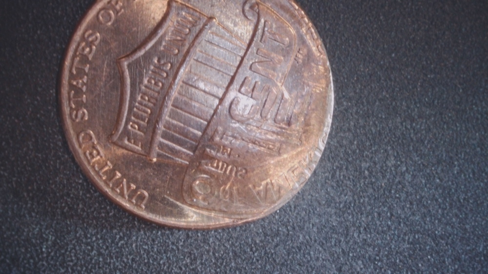 Found-This-2017-Penny-With-What-Appears-To-Be-Another-Image-Stamped-On-It