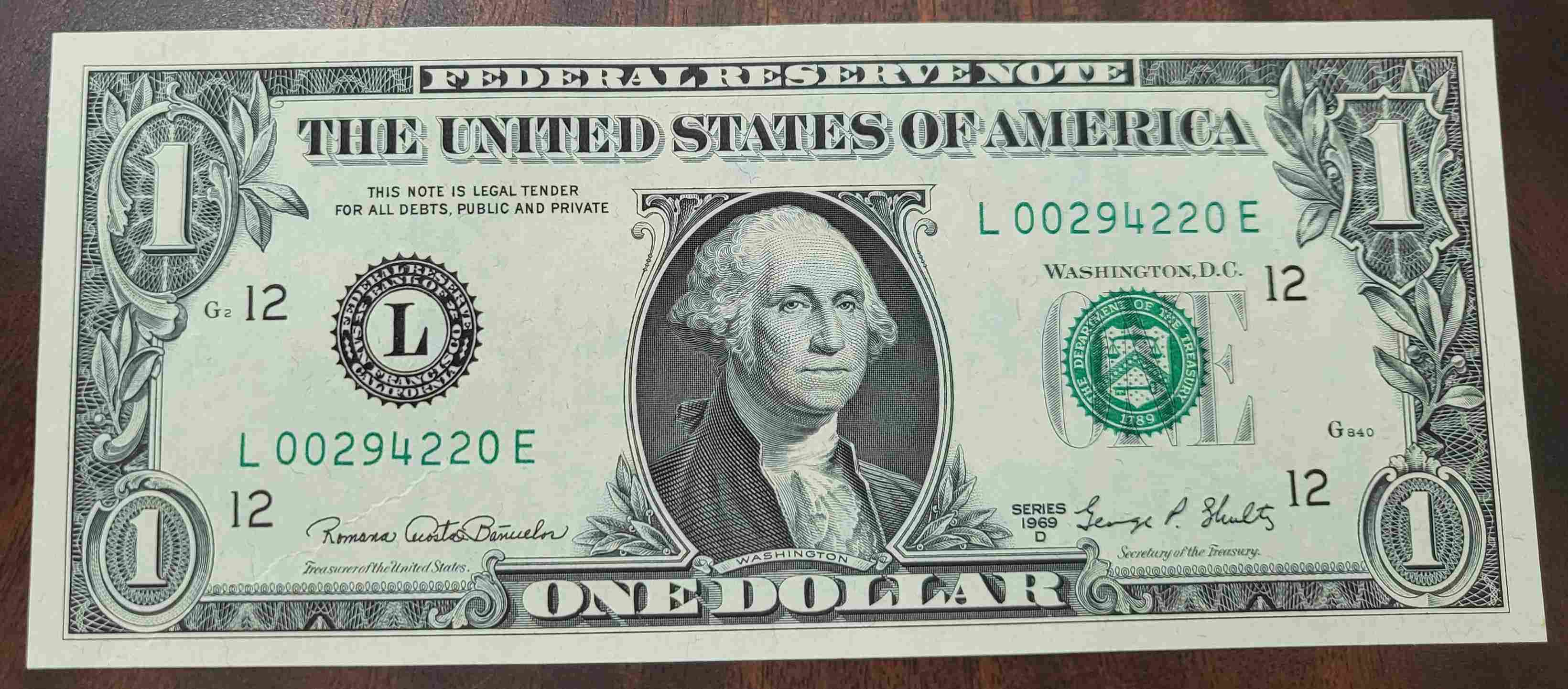 1969-D-$1-Error-With-String-In-Paper