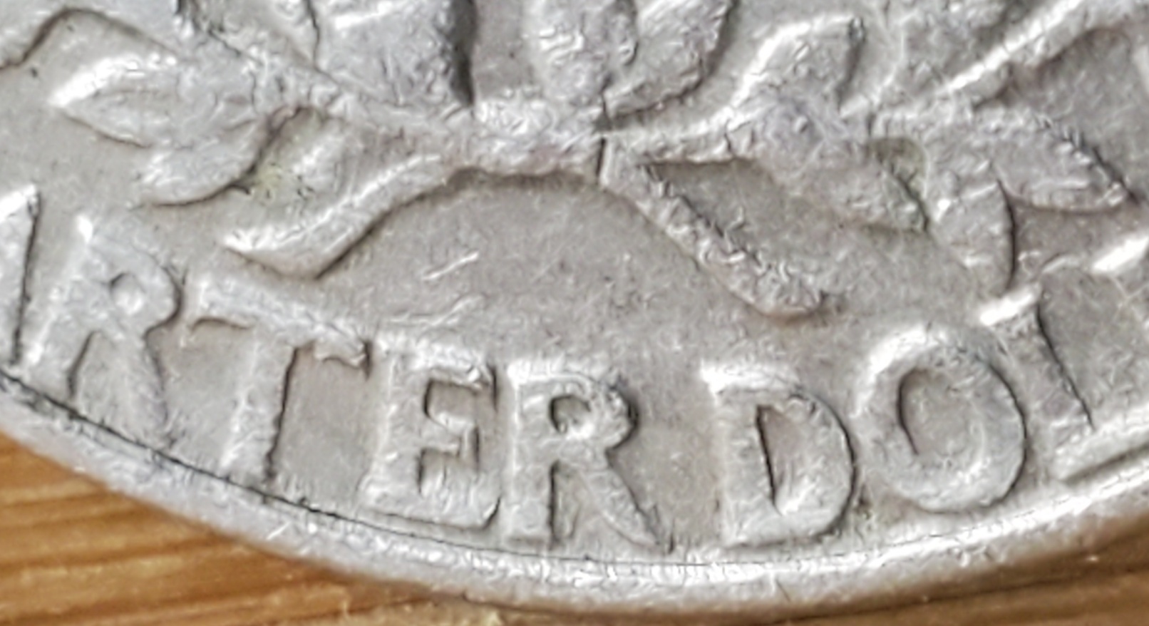 1989-P-Quarter-Reverse-'I'-In-'United'--Connected-To-Eagle-Wing;-Damage-Or-Error?