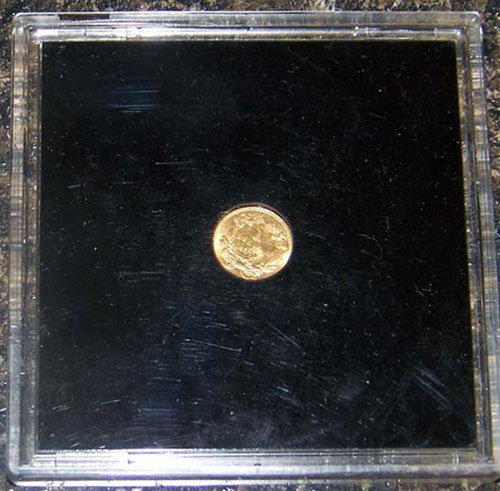 Closed-Or-Open-$1-1873-Gold-Coin?