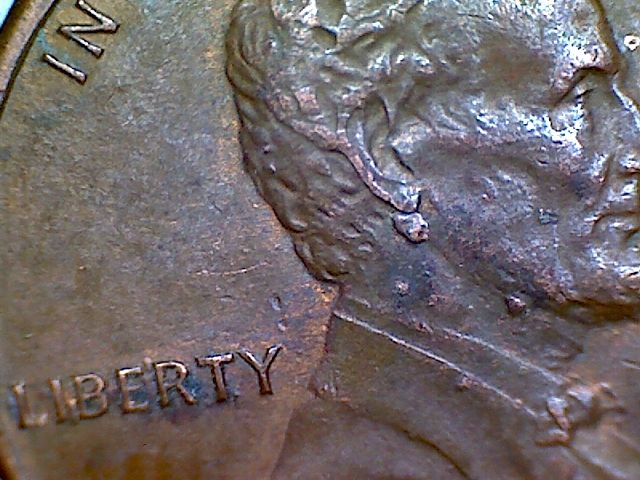 1982-Die-Chip,-Gas-Bubble-Or-Double-Ear?