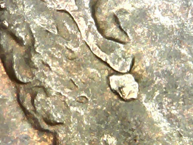 1982-Die-Chip,-Gas-Bubble-Or-Double-Ear?