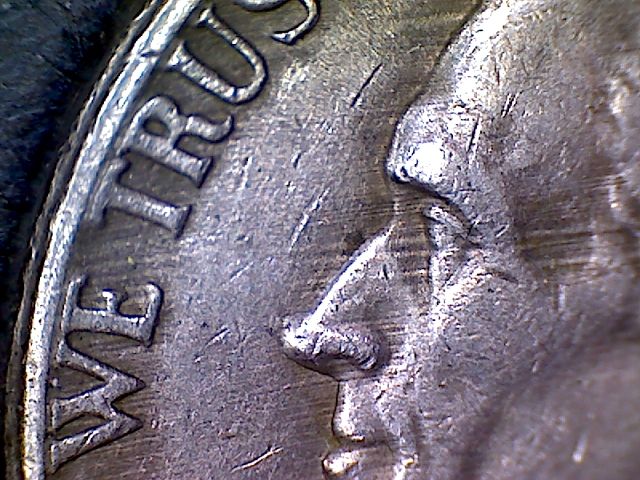 2003-P-Nickel-With-Lots-Of-Something?