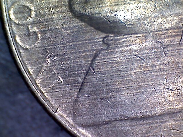 2003-P-Nickel-With-Lots-Of-Something?