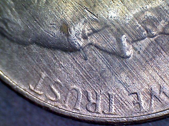 2003-P-Nickel-With-Lots-Of-Something?