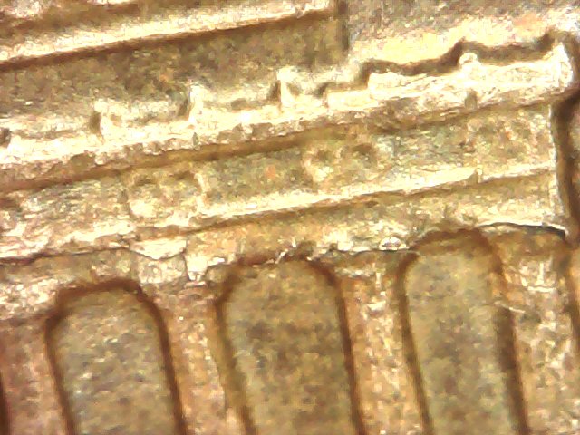 1969-D-Huge-Lamination-Or-Crack-Or-Both?