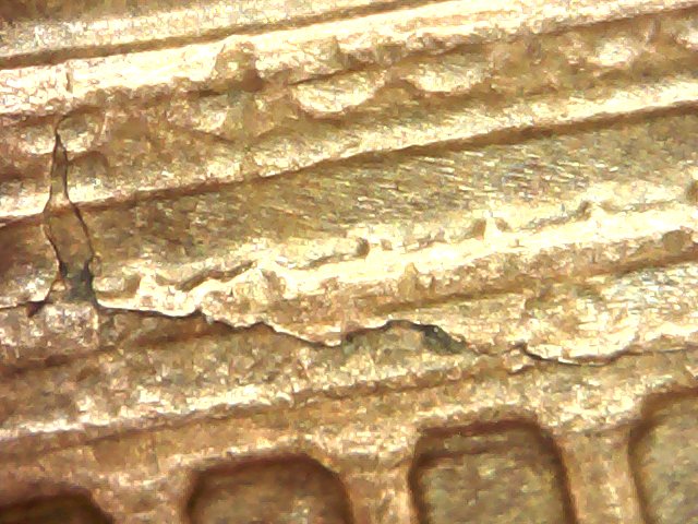 1969-D-Huge-Lamination-Or-Crack-Or-Both?