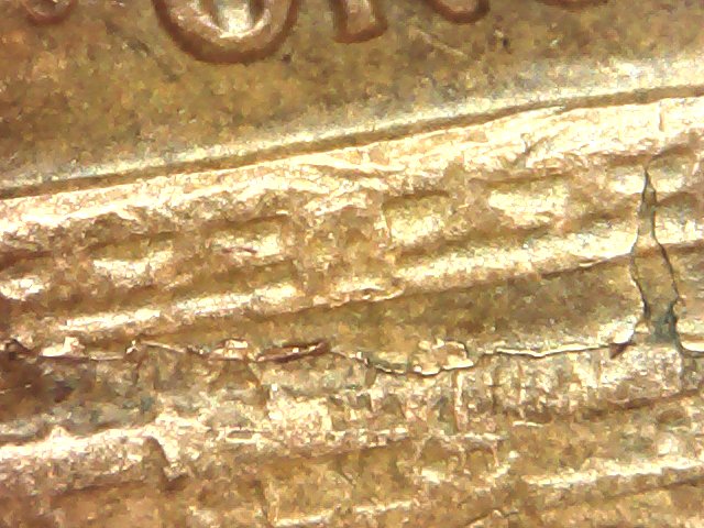 1969-D-Huge-Lamination-Or-Crack-Or-Both?
