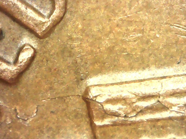 1969-D-Huge-Lamination-Or-Crack-Or-Both?