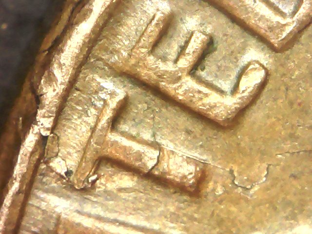 1969-D-Huge-Lamination-Or-Crack-Or-Both?