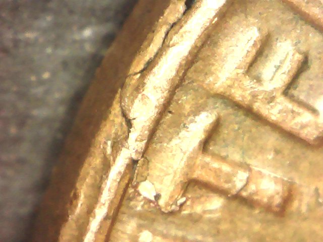 1969-D-Huge-Lamination-Or-Crack-Or-Both?