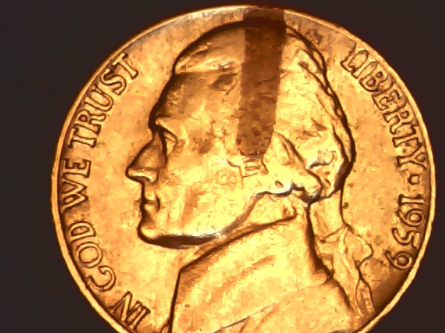 1959-D-Nickel-With-Something-Struck-Onto....