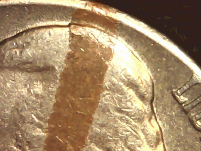 1959-D-Nickel-With-Something-Struck-Onto....